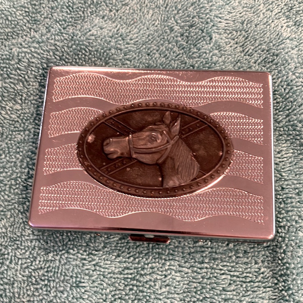 Cigarette case with horses head